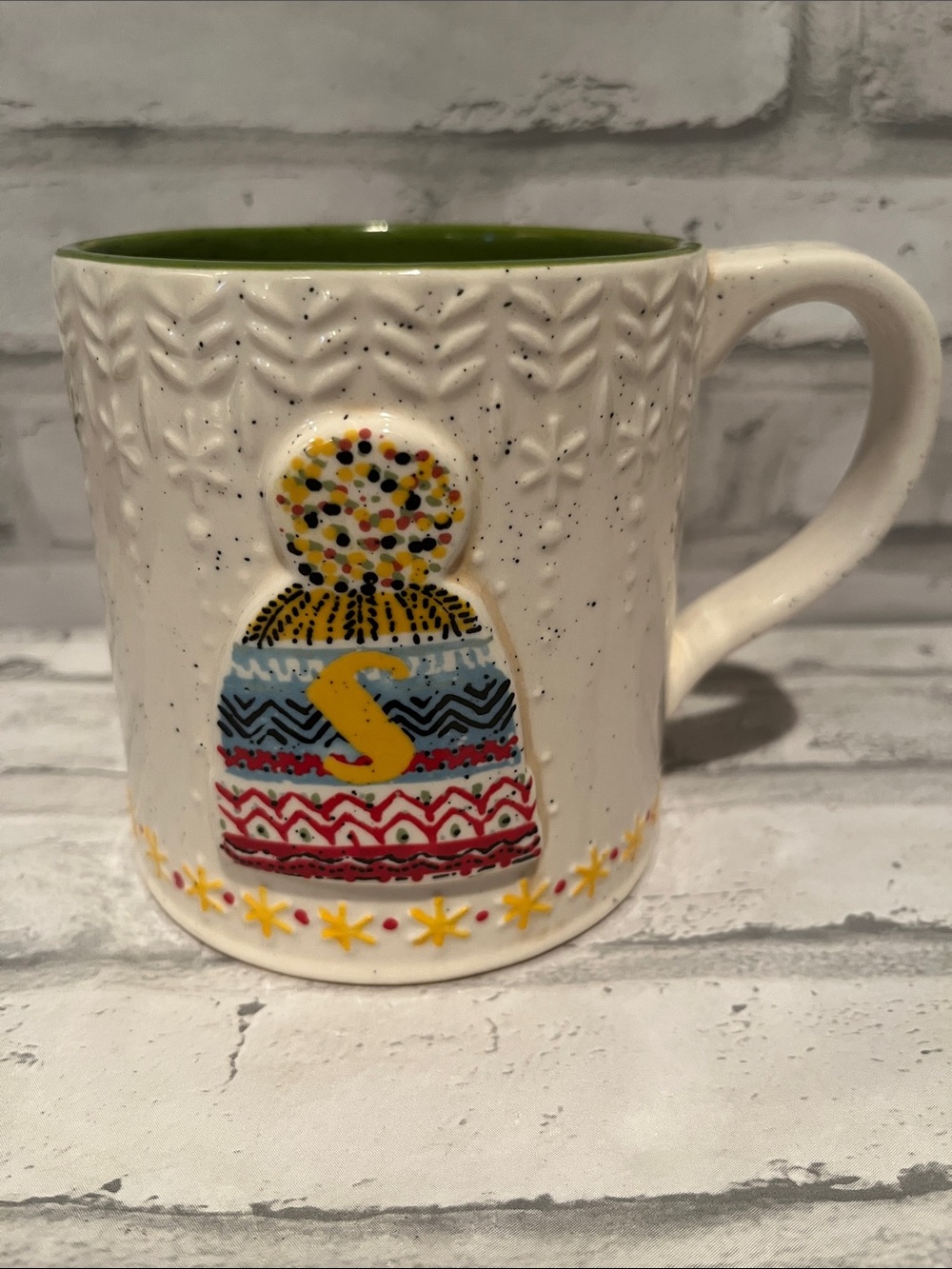 Antropologie Ceramic coffee mug Green Interior Colorful  knit-Beanie Motif “